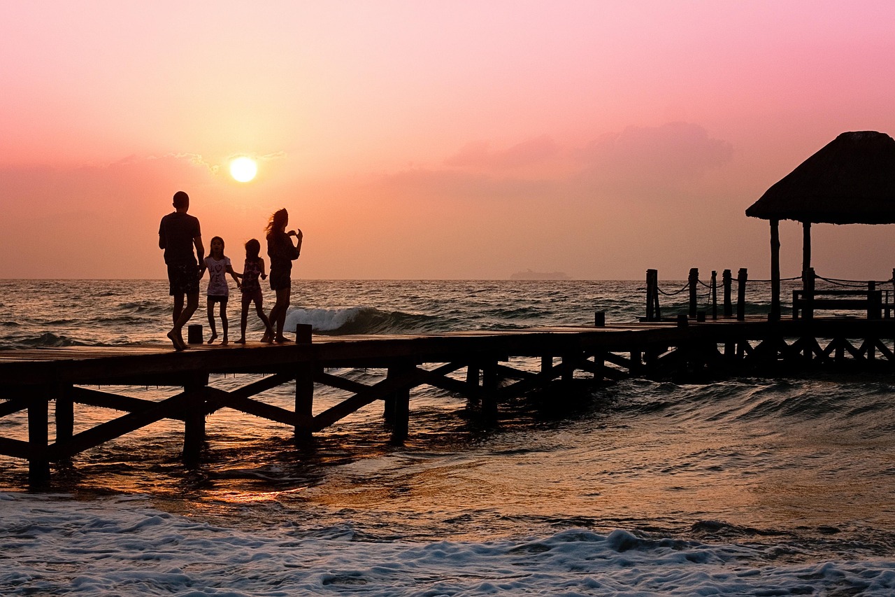 Family enjoying beach vacation in Kenya